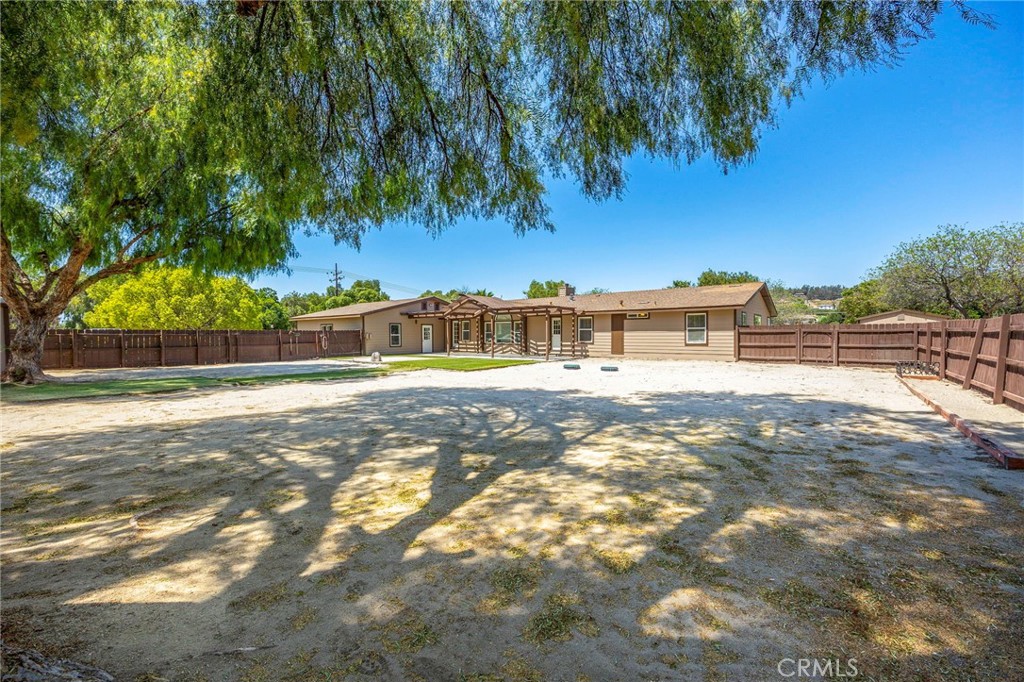37055 De Portola Road Temecula, CA 92592 - Photo 62 of 67 a view of house with a yard