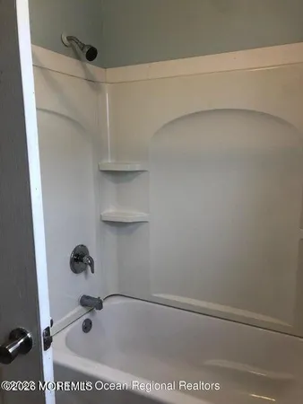 a bathroom with a bathtub