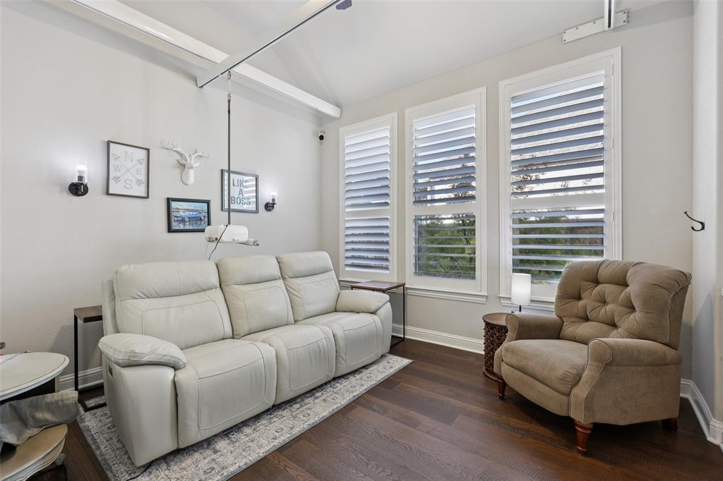 451 Morgan Lane Prosper, TX 75078 - Photo 18 of 38 a living room with furniture and a large window