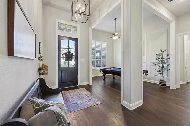 a view of a livingroom with furniture and windows
