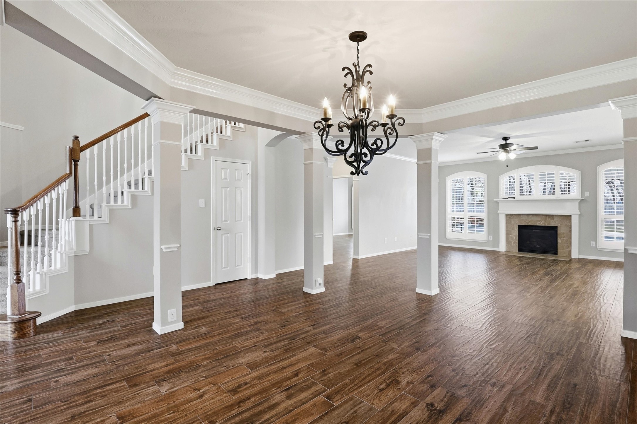 3602 River Bend Drive Rosenberg, TX 77471 - Photo 18 of 49 a view of a livingroom with wooden floor and a fireplace