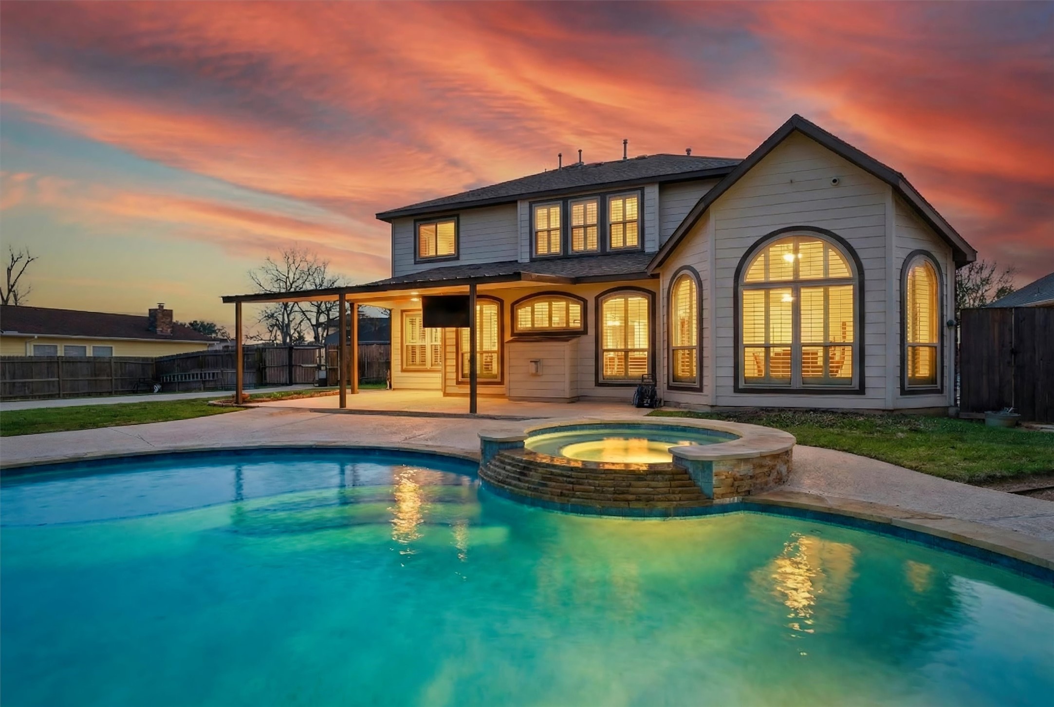 3602 River Bend Drive Rosenberg, TX 77471 - Photo 2 of 49 a front view of a house with swimming pool having outdoor seating