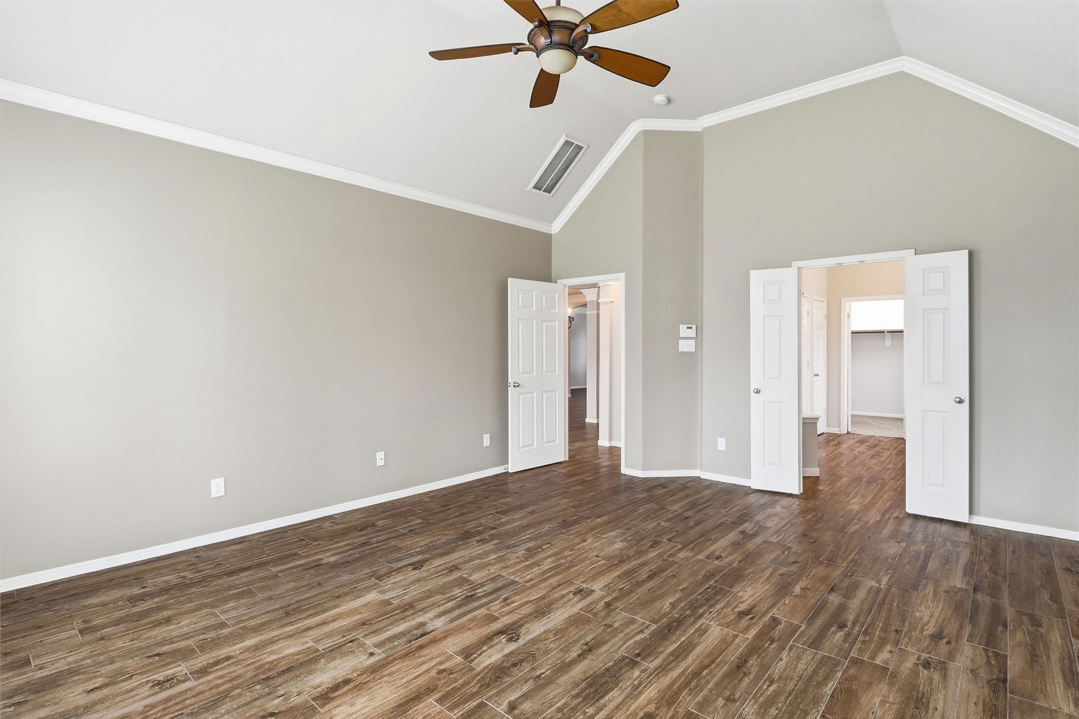 3602 River Bend Drive Rosenberg, TX 77471 - Photo 30 of 49 a view of a livingroom with a ceiling fan and wooden floor