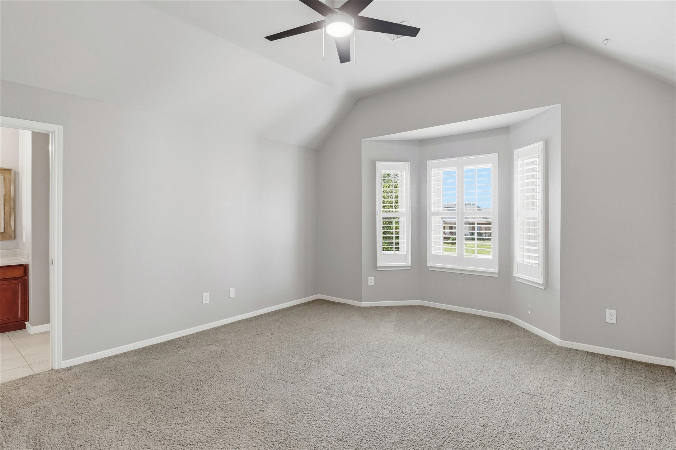 3602 River Bend Drive Rosenberg, TX 77471 - Photo 37 of 49 an empty room with a window and a fan