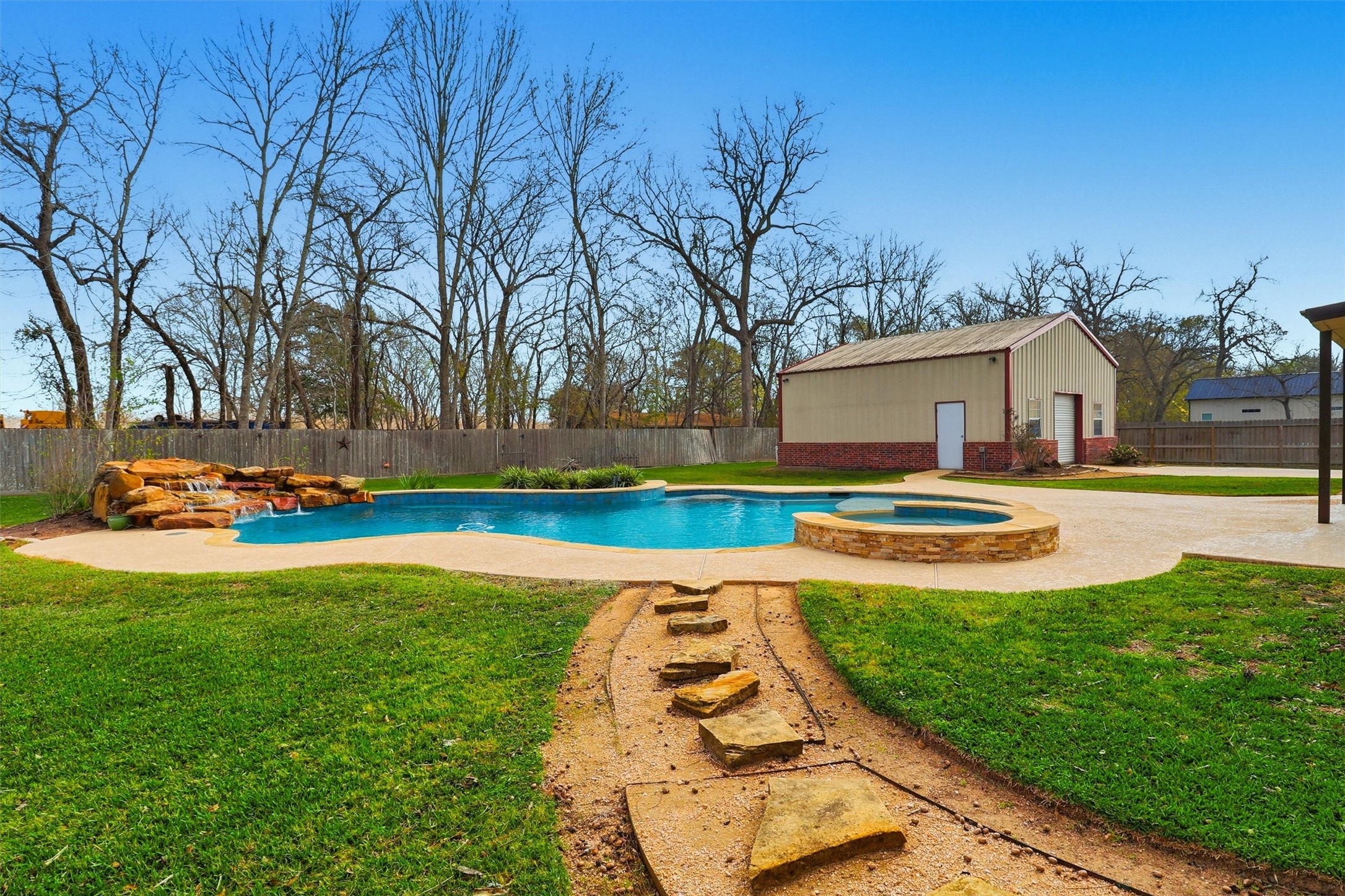 3602 River Bend Drive Rosenberg, TX 77471 - Photo 45 of 49 a view of a swimming pool with some plants and large trees