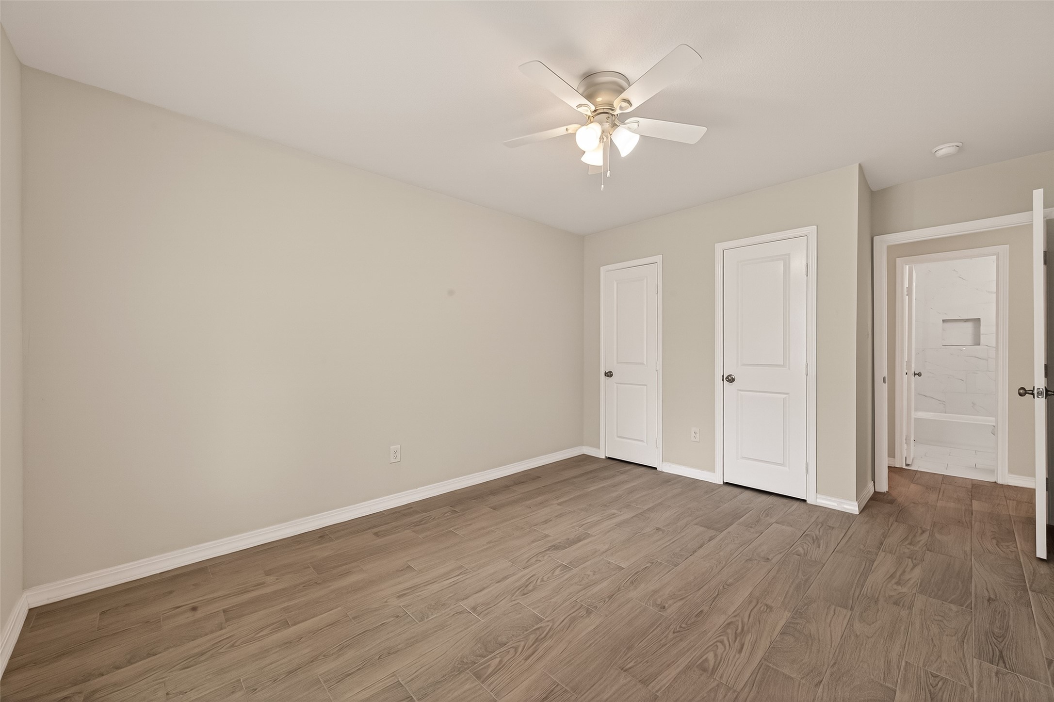 3710 Daphne Street Houston, TX 77021 - Photo 17 of 39 a view of an empty room with wooden floor