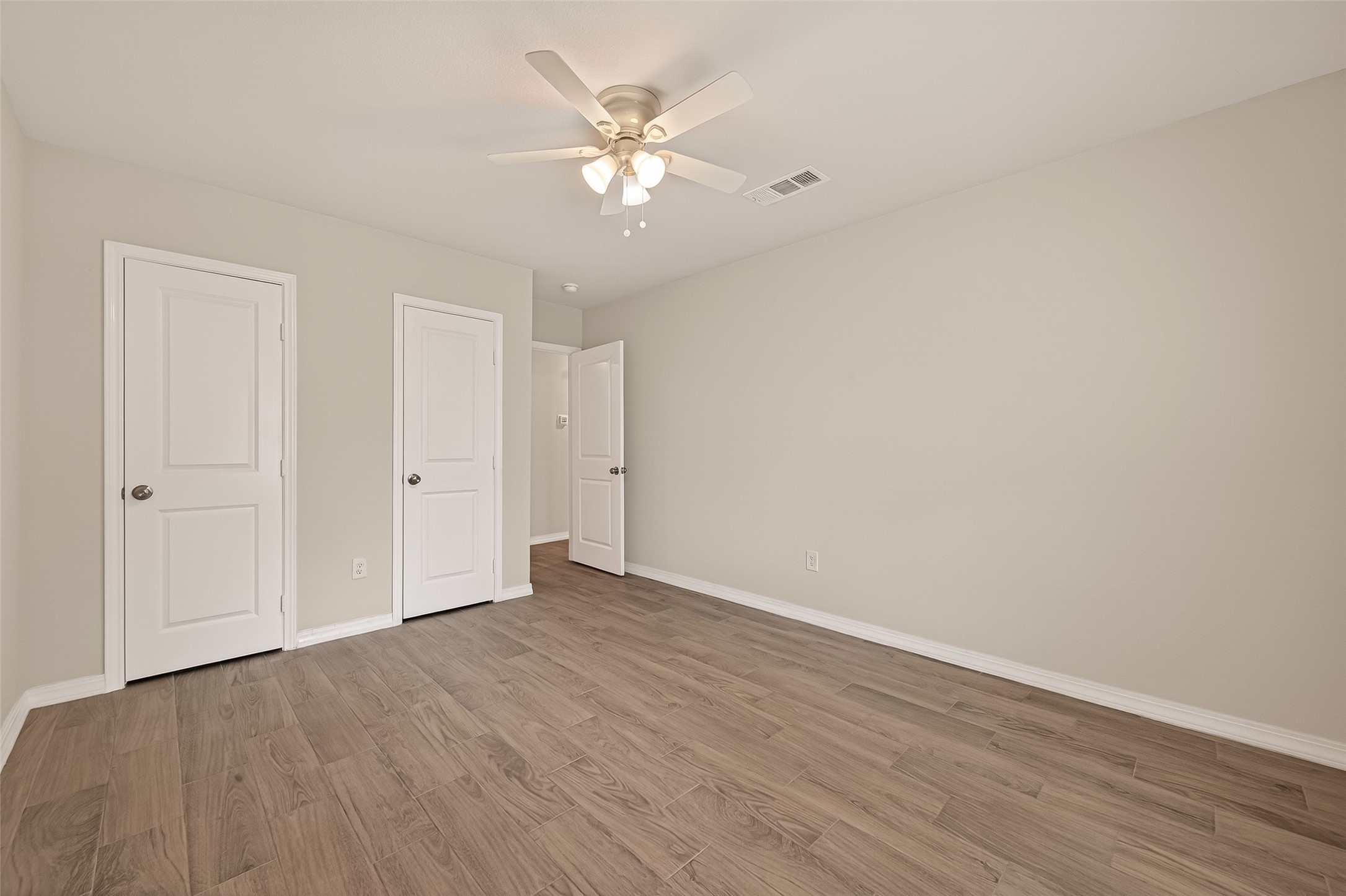 3710 Daphne Street Houston, TX 77021 - Photo 18 of 39 a view of an empty room with wooden floor