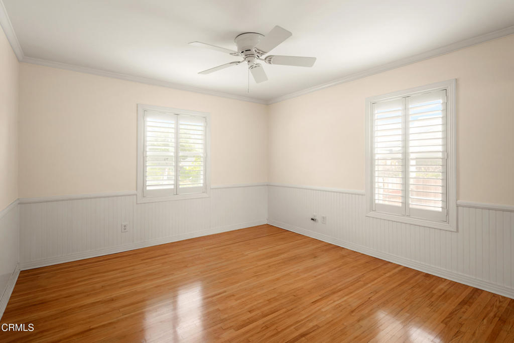 1587 North Harding Avenue Pasadena, CA 91104 - Photo 19 of 37 wooden floor in an empty room with a window