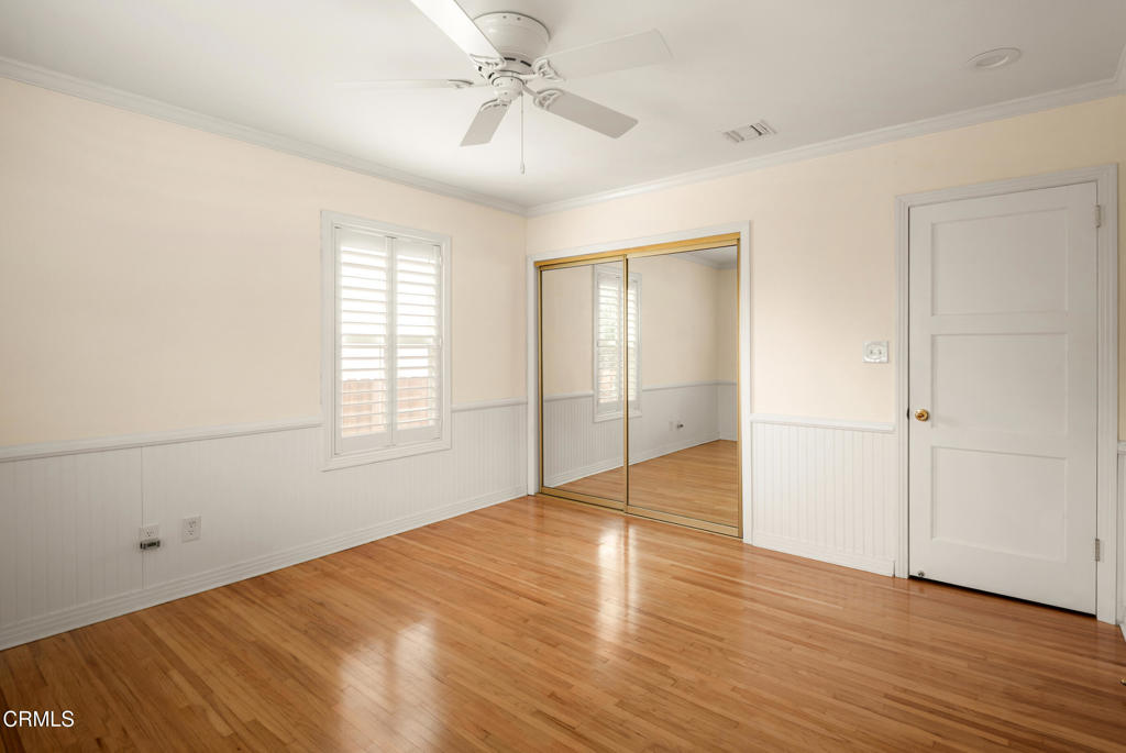 1587 North Harding Avenue Pasadena, CA 91104 - Photo 20 of 37 a view of empty room with wooden floor and fan