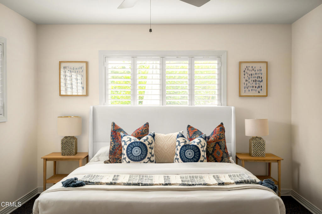 1587 North Harding Avenue Pasadena, CA 91104 - Photo 24 of 37 a view of a bedroom with a bed and a window