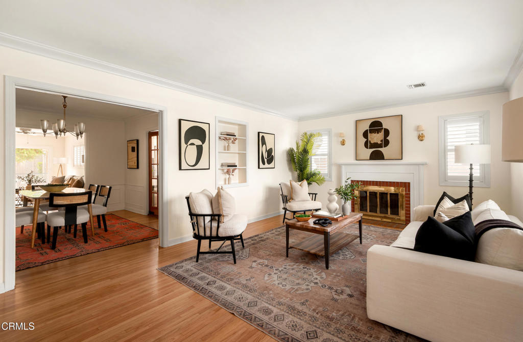 1587 North Harding Avenue Pasadena, CA 91104 - Photo 3 of 37 a living room with furniture a fireplace and a window