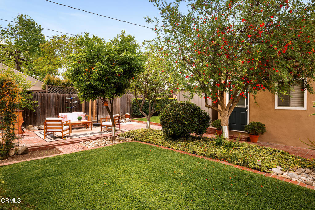 1587 North Harding Avenue Pasadena, CA 91104 - Photo 33 of 37 a view of a house with backyard and sitting area