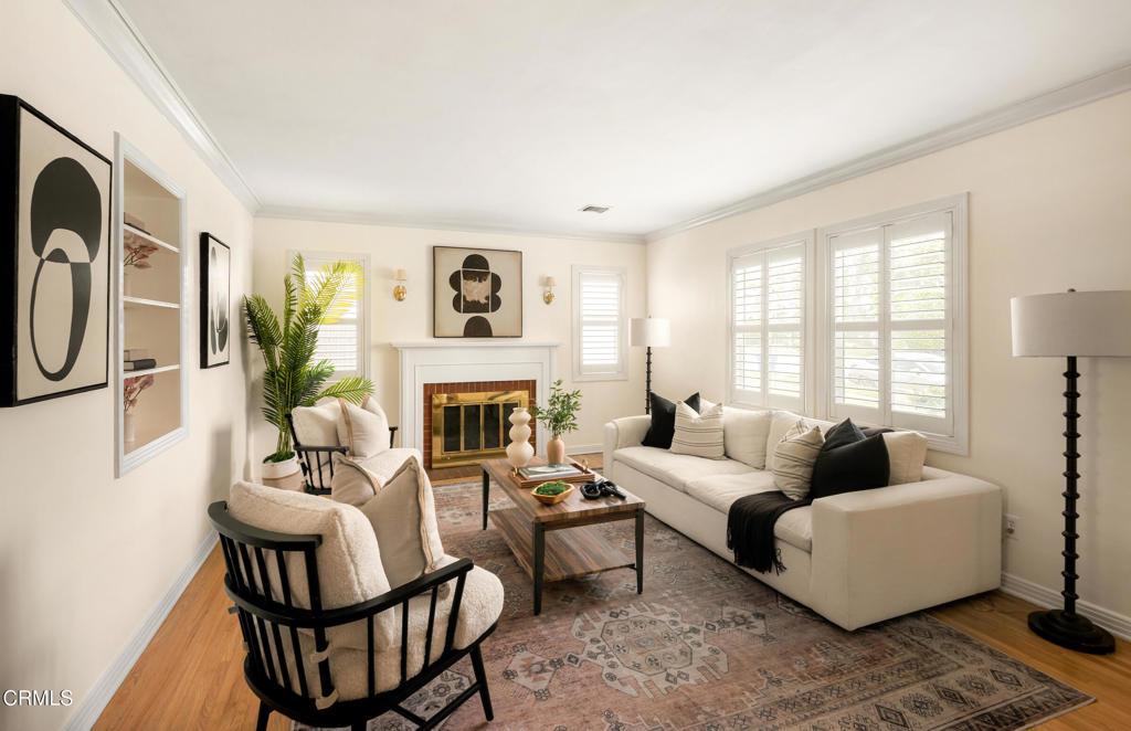 1587 North Harding Avenue Pasadena, CA 91104 - Photo 5 of 37 a living room with furniture a fireplace and a large window