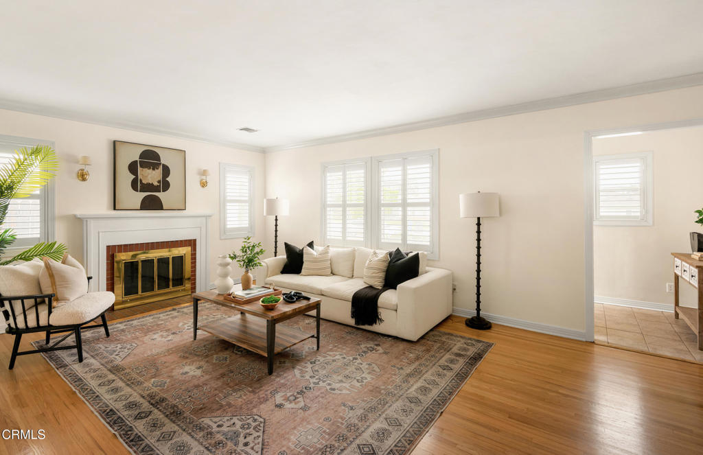 1587 North Harding Avenue Pasadena, CA 91104 - Photo 6 of 37 a living room with furniture and a fireplace