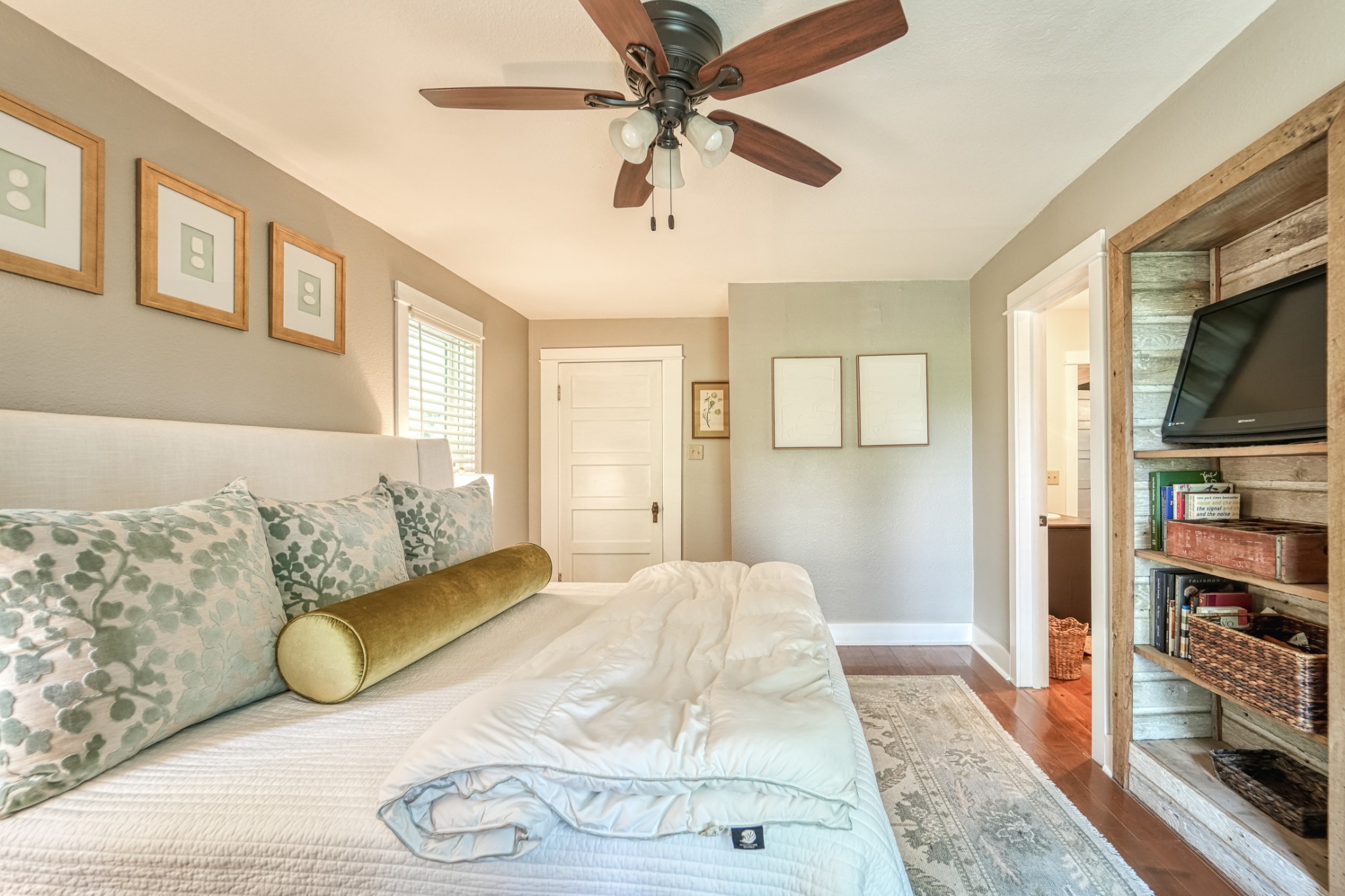 5829 County Road 6 Florence, AL 35633 - Photo 16 of 32 a bedroom with a bed and a flat screen tv