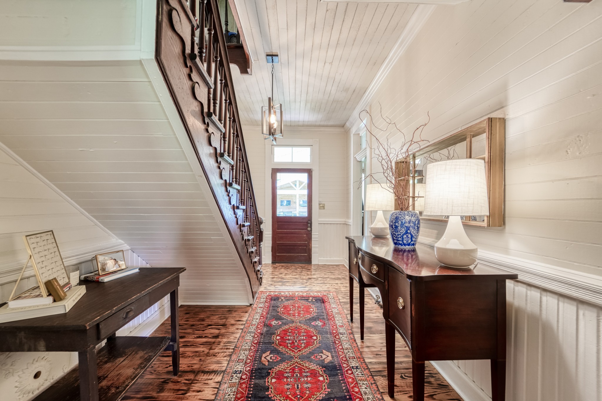 5829 County Road 6 Florence, AL 35633 - Photo 9 of 32 a living room with chairs and a table