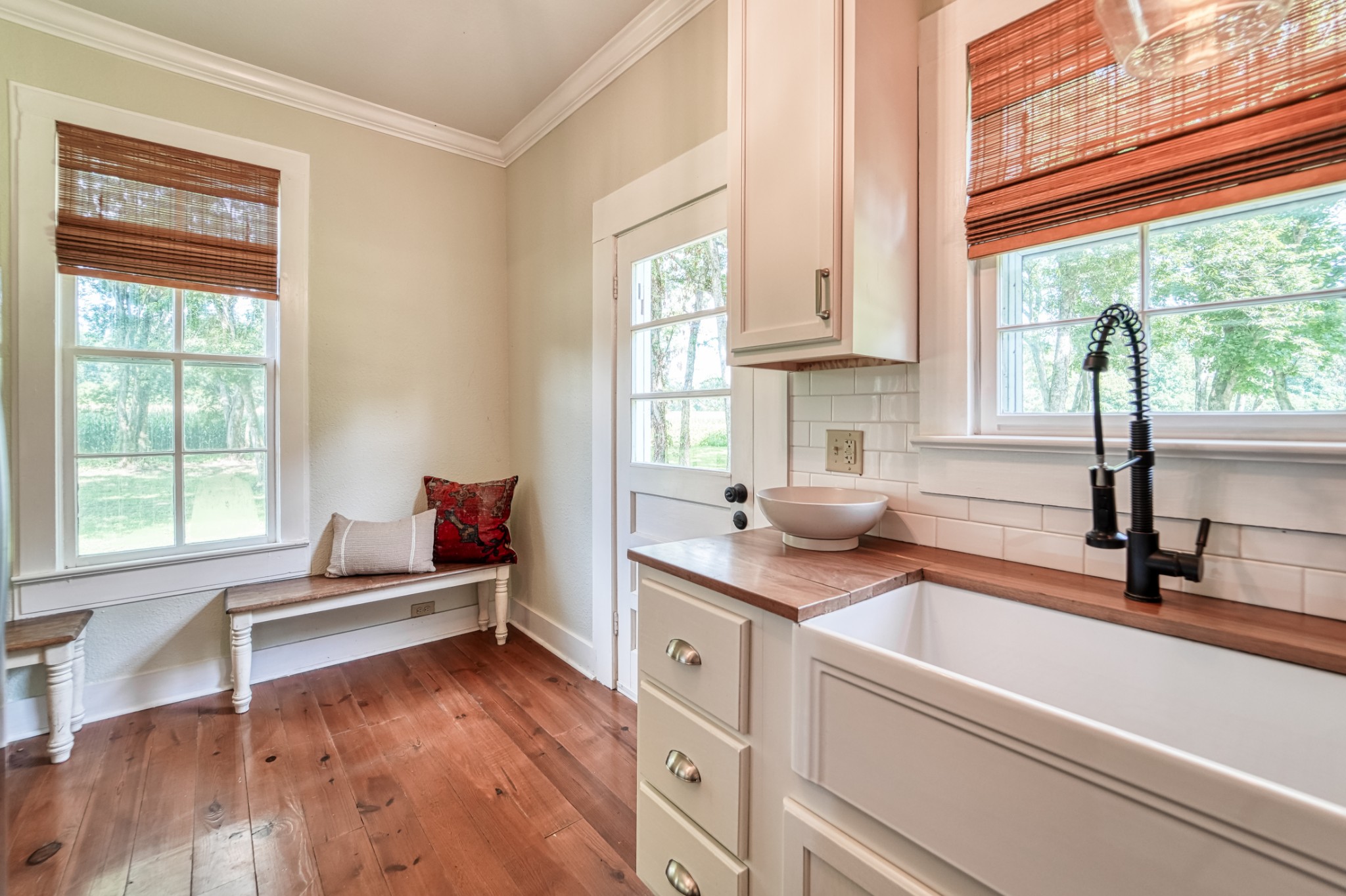 5829 County Road 6 Florence, AL 35633 - Photo 10 of 32 a kitchen with granite countertop a sink and a window