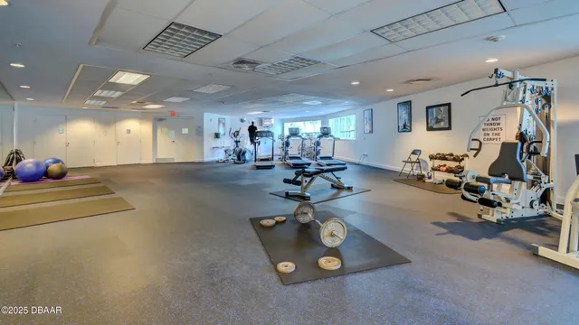 a view of a room with gym equipment
