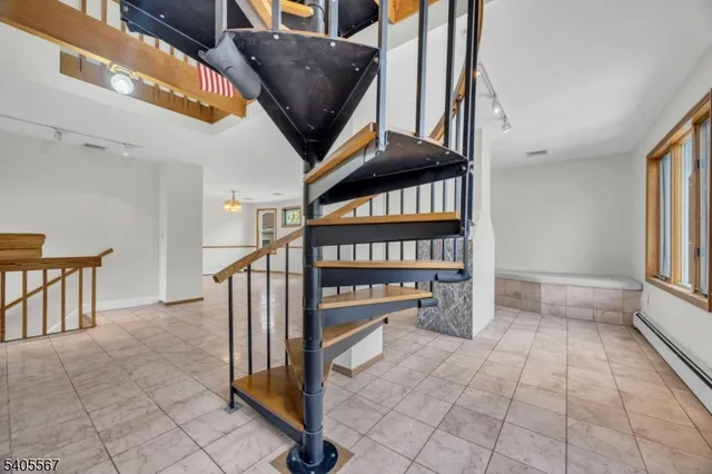 a view of an entryway with a workspace