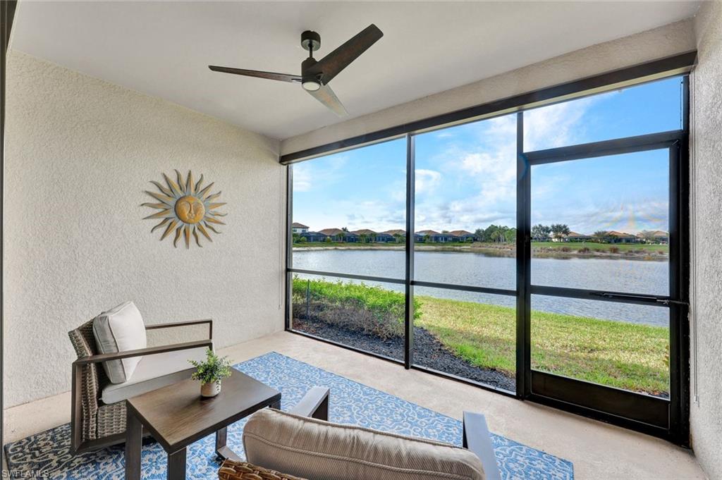 9373 Pocida Court, Unit 104 Naples, FL 34119 - Photo 17 of 24 a living room with furniture and a window