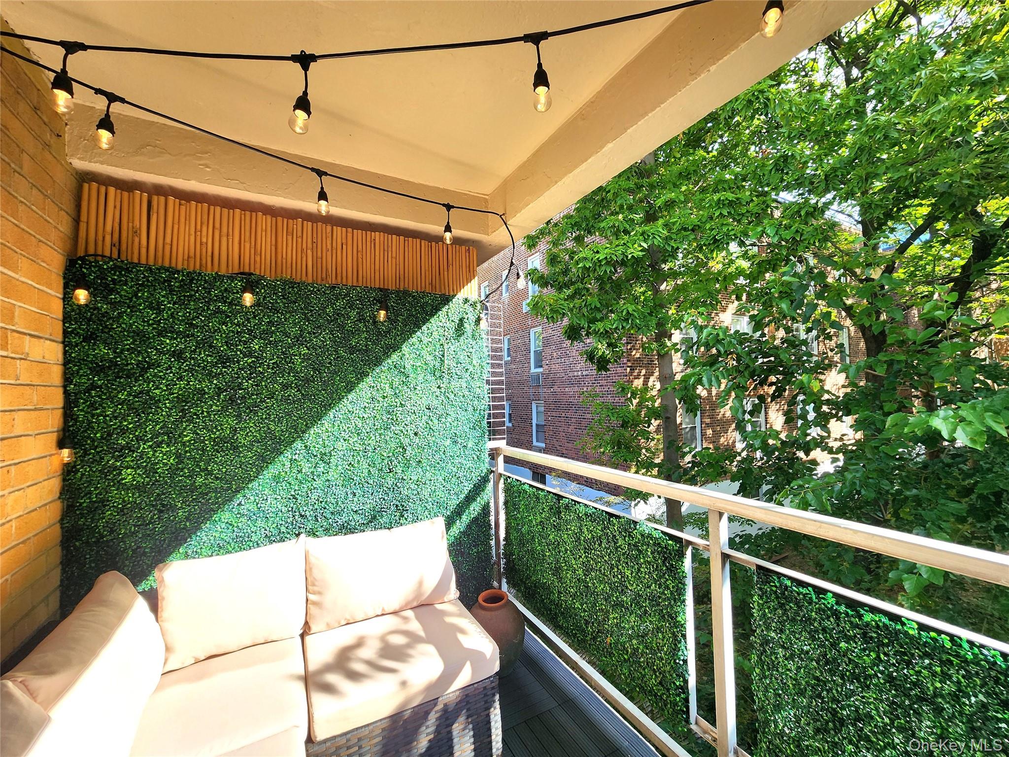 25 Park Place, Unit 3R Great Neck, NY 11021 - Photo 12 of 18 a view of a balcony with yard