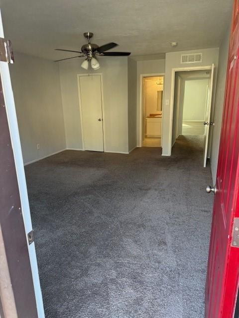 6000 Westridge Lane, Unit 802 Fort Worth, TX 76116 - Photo 11 of 12 an empty room with a ceiling fan and a walk in closet
