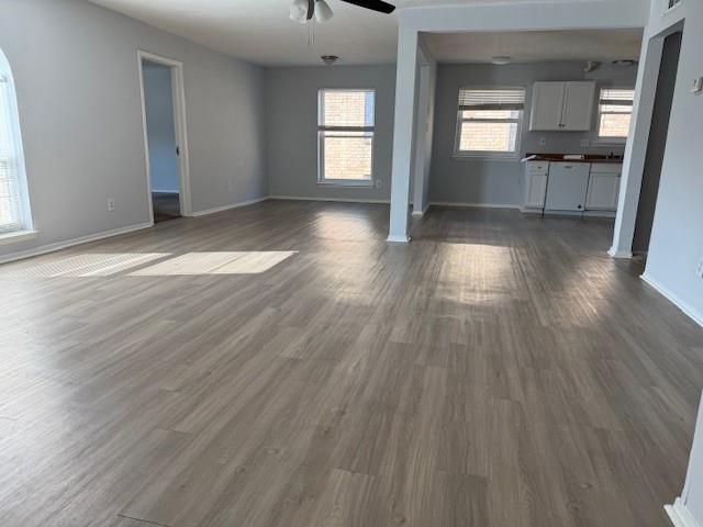 6000 Westridge Lane, Unit 802 Fort Worth, TX 76116 - Photo 3 of 12 an empty room with wooden floor and windows