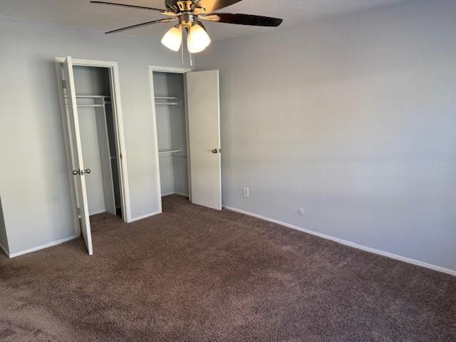 6000 Westridge Lane, Unit 802 Fort Worth, TX 76116 - Photo 7 of 12 an empty room with closet and a chandelier fan