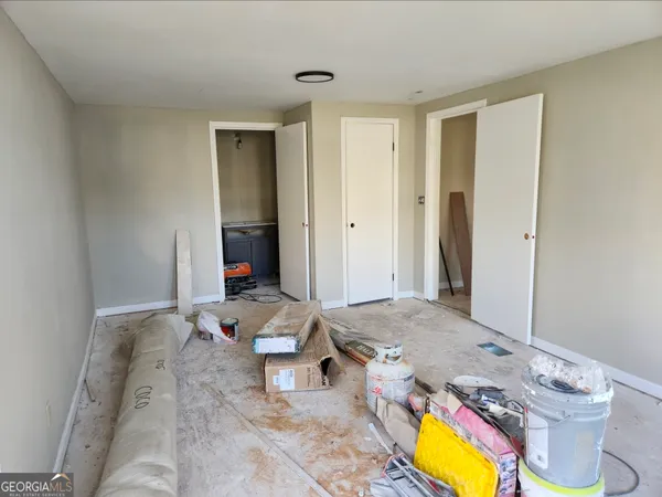 a living room with furniture and window
