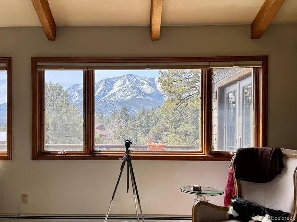 a room with window and furniture