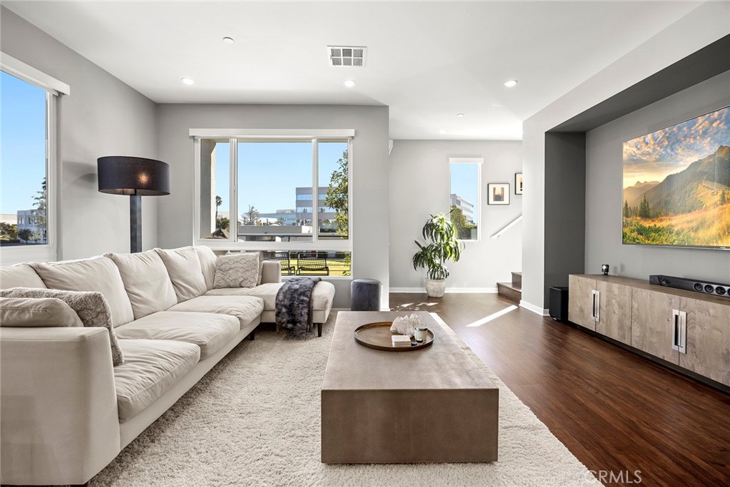 147 Schick Irvine, CA 92614 - Photo 12 of 35 a living room with furniture and a flat screen tv