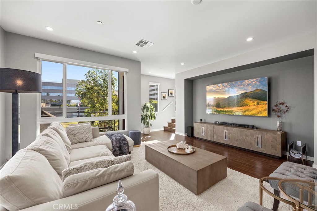 147 Schick Irvine, CA 92614 - Photo 14 of 35 a living room with furniture and a flat screen tv