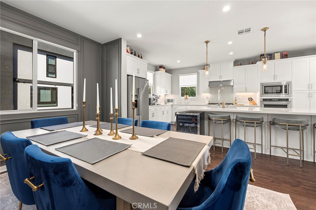 147 Schick Irvine, CA 92614 - Photo 20 of 35 a living room with stainless steel appliances kitchen island granite countertop furniture and a kitchen view