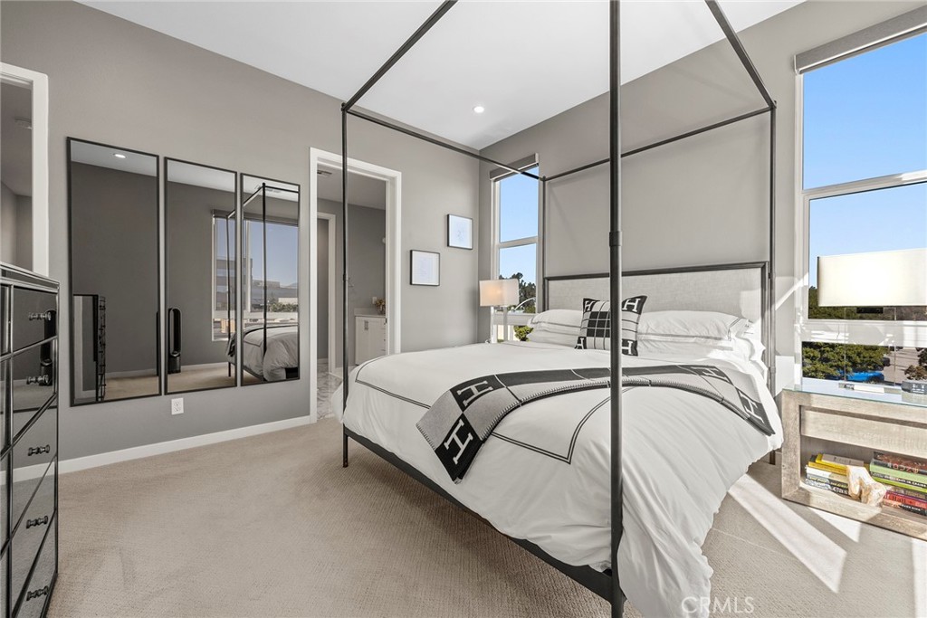 147 Schick Irvine, CA 92614 - Photo 25 of 35 a bedroom with a bed and a mirror