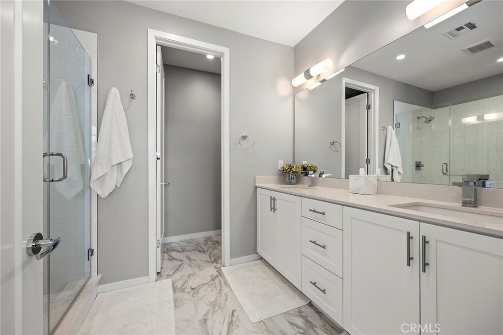 147 Schick Irvine, CA 92614 - Photo 26 of 35 a bathroom with a double vanity sink mirror and double