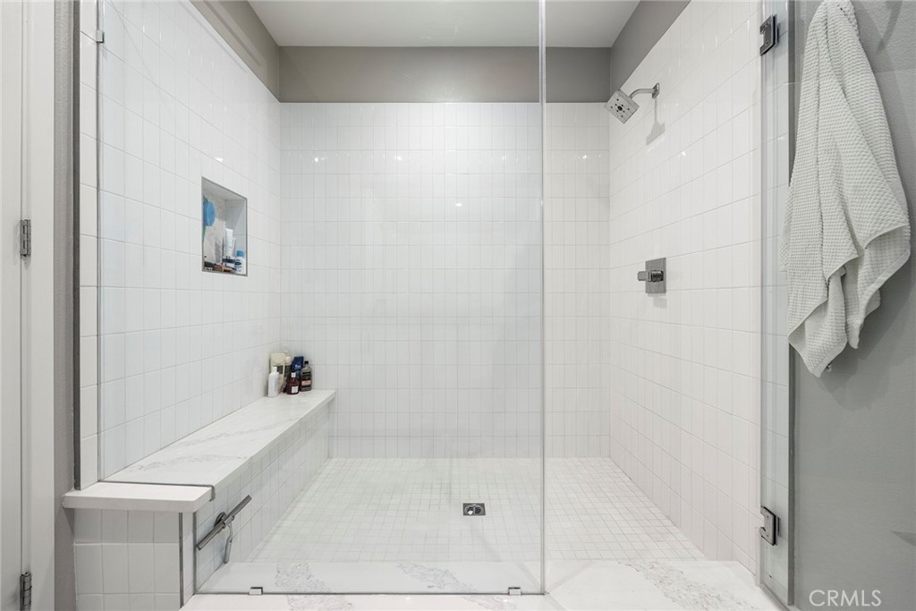 147 Schick Irvine, CA 92614 - Photo 27 of 35 a bathroom with a bathtub and a shower