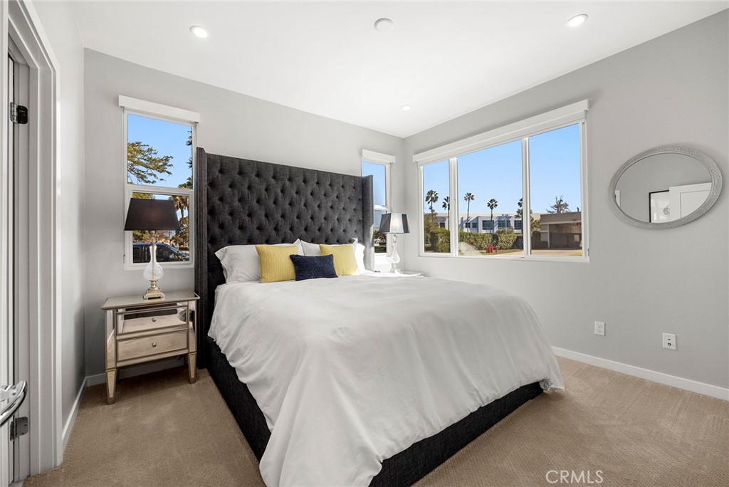 147 Schick Irvine, CA 92614 - Photo 7 of 35 a bedroom with a bed and a lamp on dresser