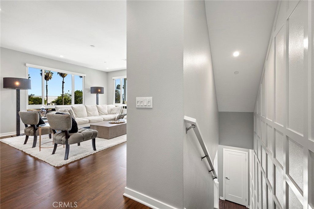 147 Schick Irvine, CA 92614 - Photo 9 of 35 a living room with furniture and a chandelier