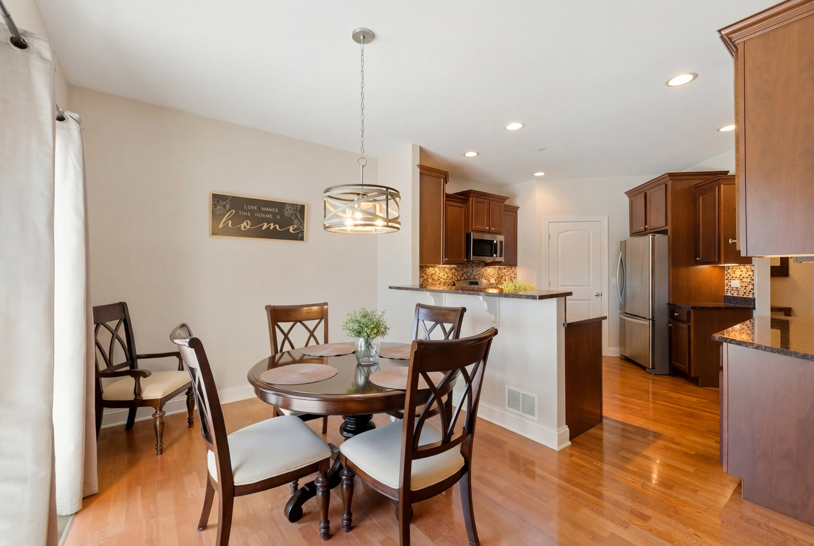 317 Nicole Way Itasca, IL 60143 - Photo 13 of 36 a view of a dining room with furniture