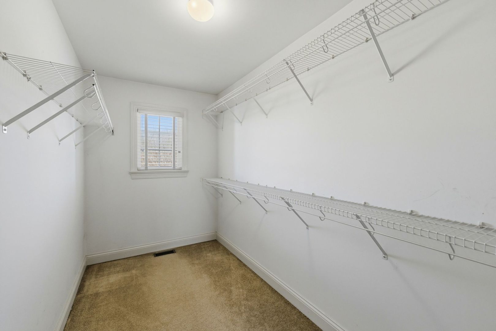 317 Nicole Way Itasca, IL 60143 - Photo 17 of 36 a view of a room that has a window in it