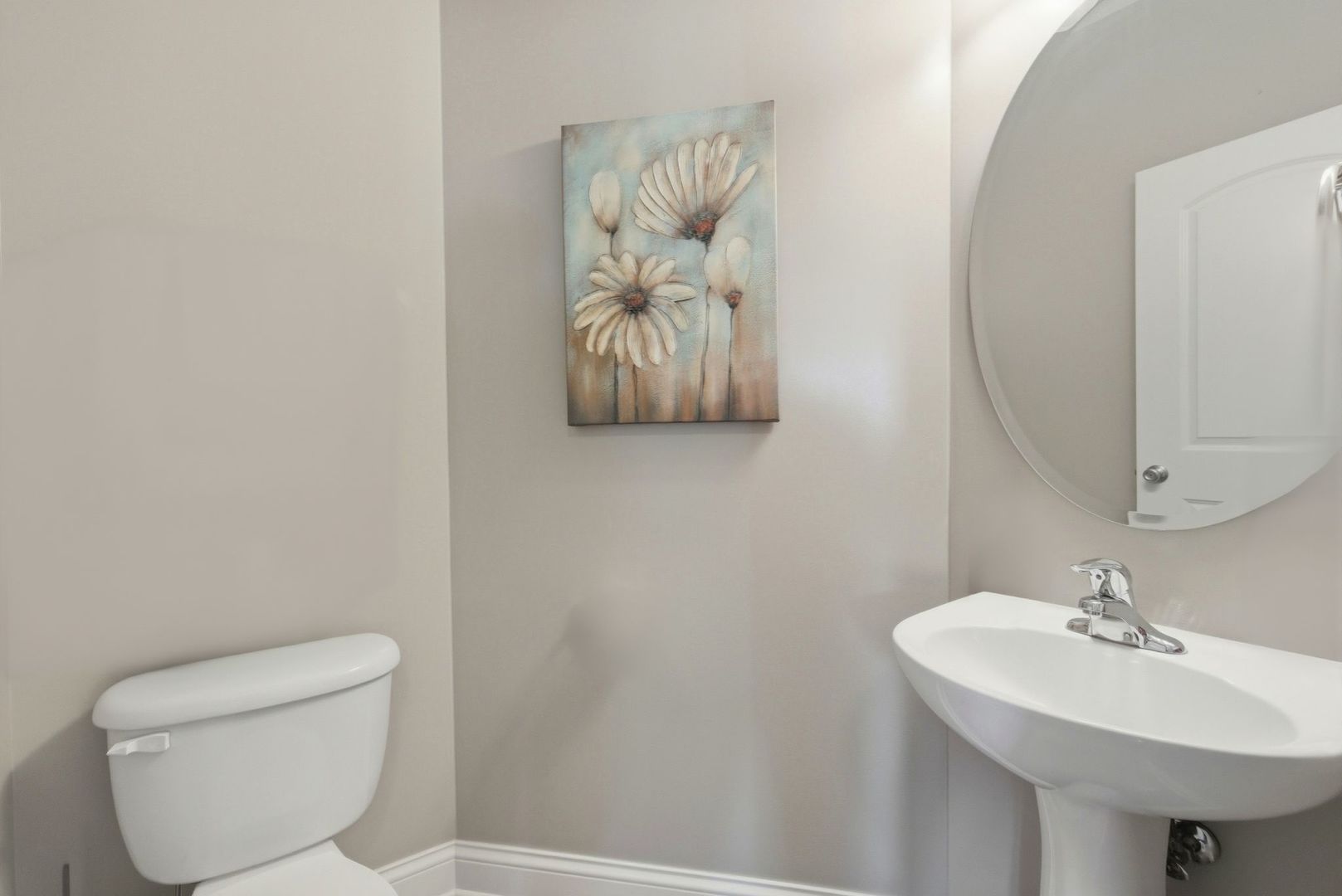 317 Nicole Way Itasca, IL 60143 - Photo 24 of 36 a bathroom with a toilet sink and mirror