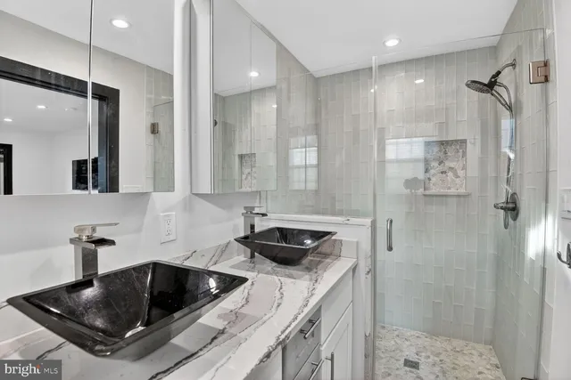 a kitchen with a sink and a refrigerator