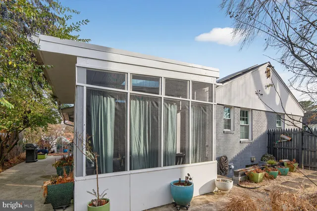 a view of balcony with furniture