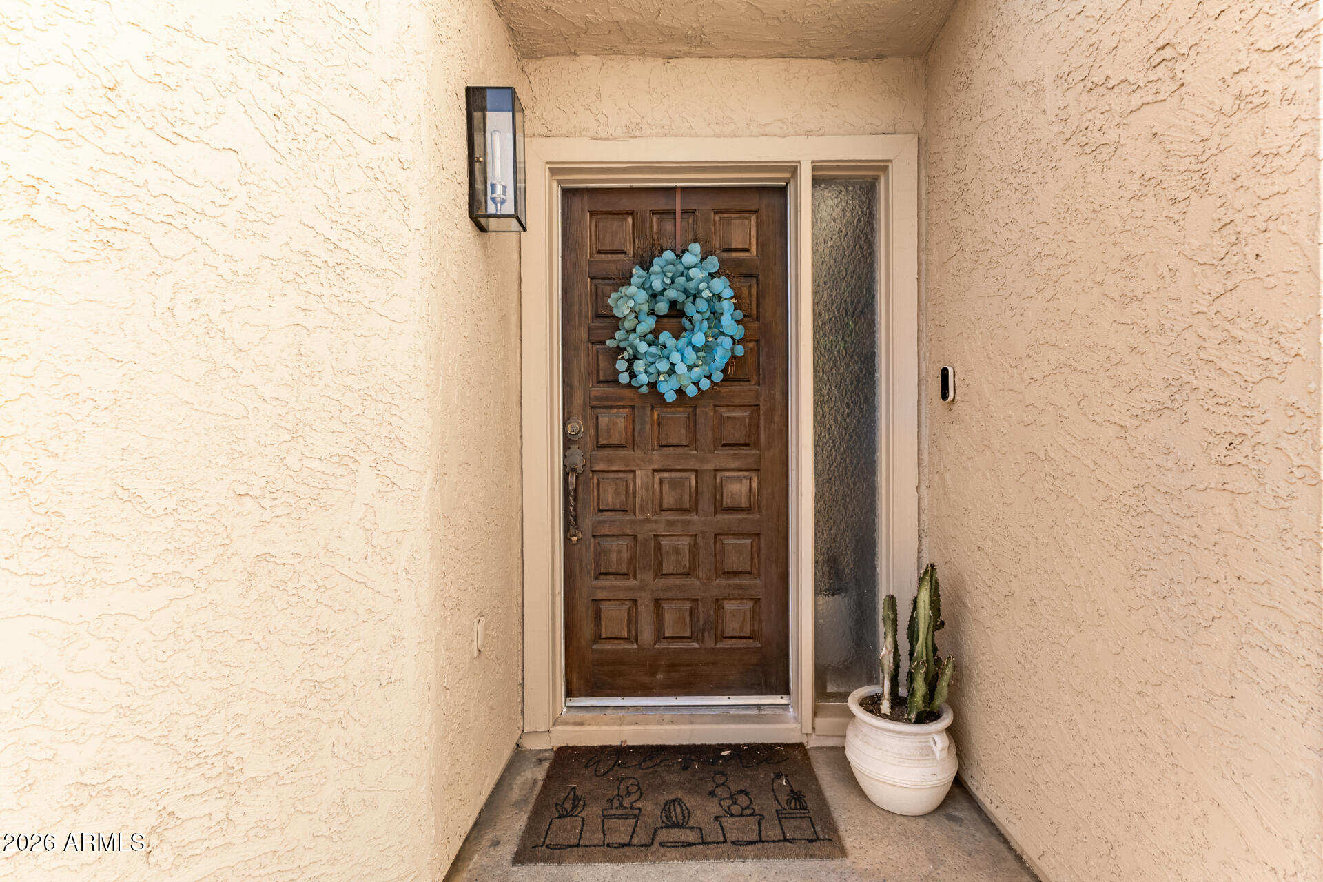 5812 North 12th Street, Unit 34 Phoenix, AZ 85014 - Photo 3 of 39 a view of a entryway door of the house