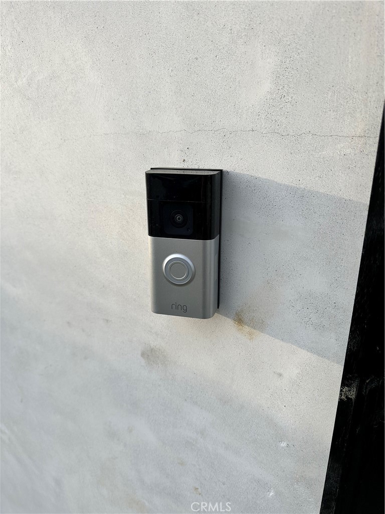 9585 Woodale Avenue Arleta, CA 91331 - Photo 18 of 21 a view of a livingroom with washer and dryer