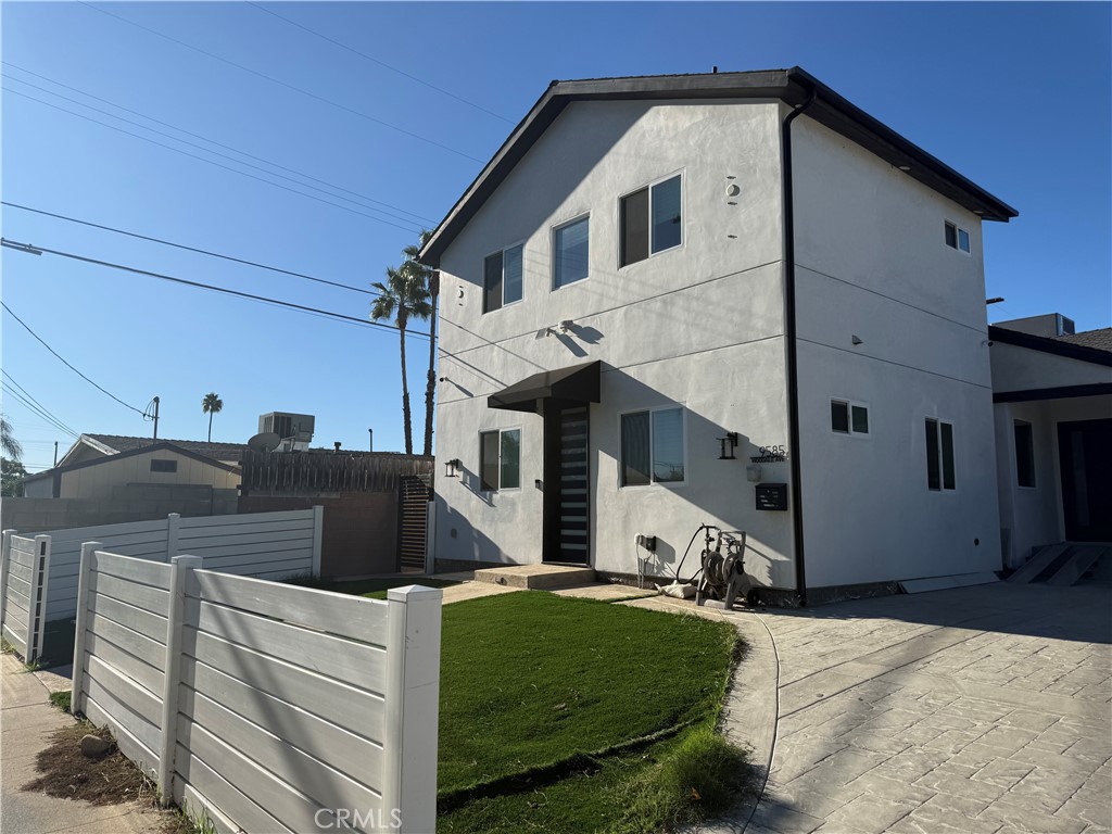 9585 Woodale Avenue Arleta, CA 91331 - Photo 2 of 21 a view of a house with a yard