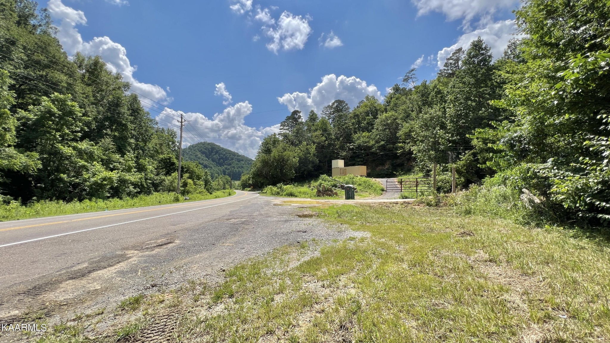 4965 Jones Cove Road Cosby, TN 37722 - Photo 17 of 50 a view of a house with pool and a yard