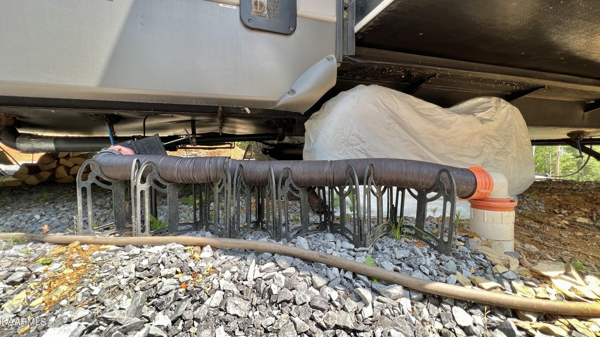 4965 Jones Cove Road Cosby, TN 37722 - Photo 32 of 50 a view of a chairs and table in the patio