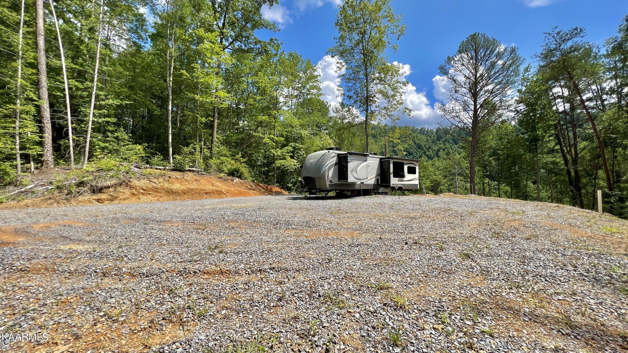 4965 Jones Cove Road Cosby, TN 37722 - Photo 34 of 50 a house with trees in the background