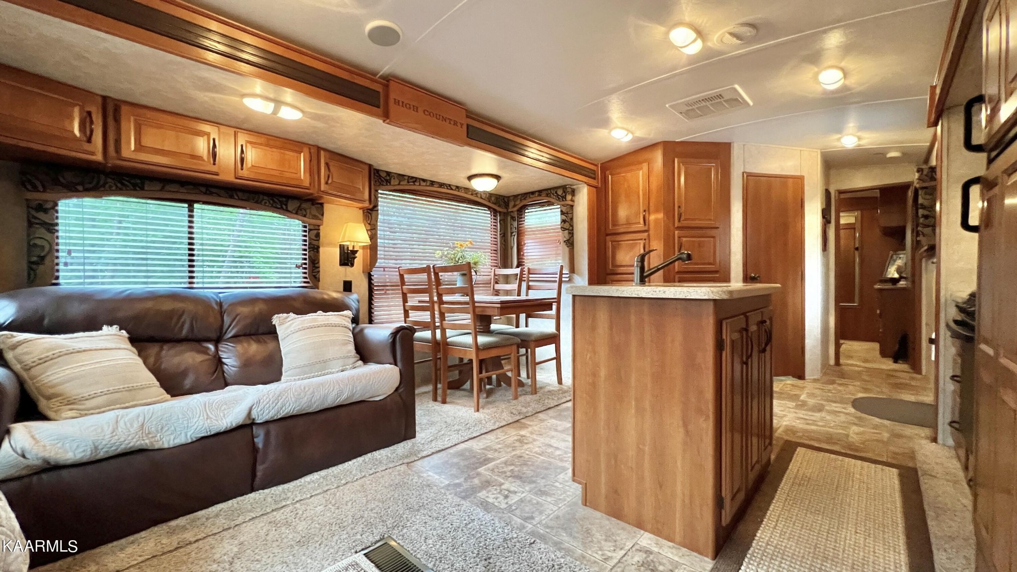 4965 Jones Cove Road Cosby, TN 37722 - Photo 44 of 50 a living room with furniture a large window and kitchen view